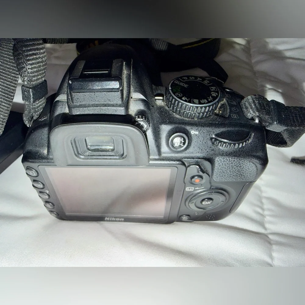 Nikon D3100 DSLR Camera with 18-55mm f/3.5-5.6 Auto Focus-S Nikkor Zoom Lens